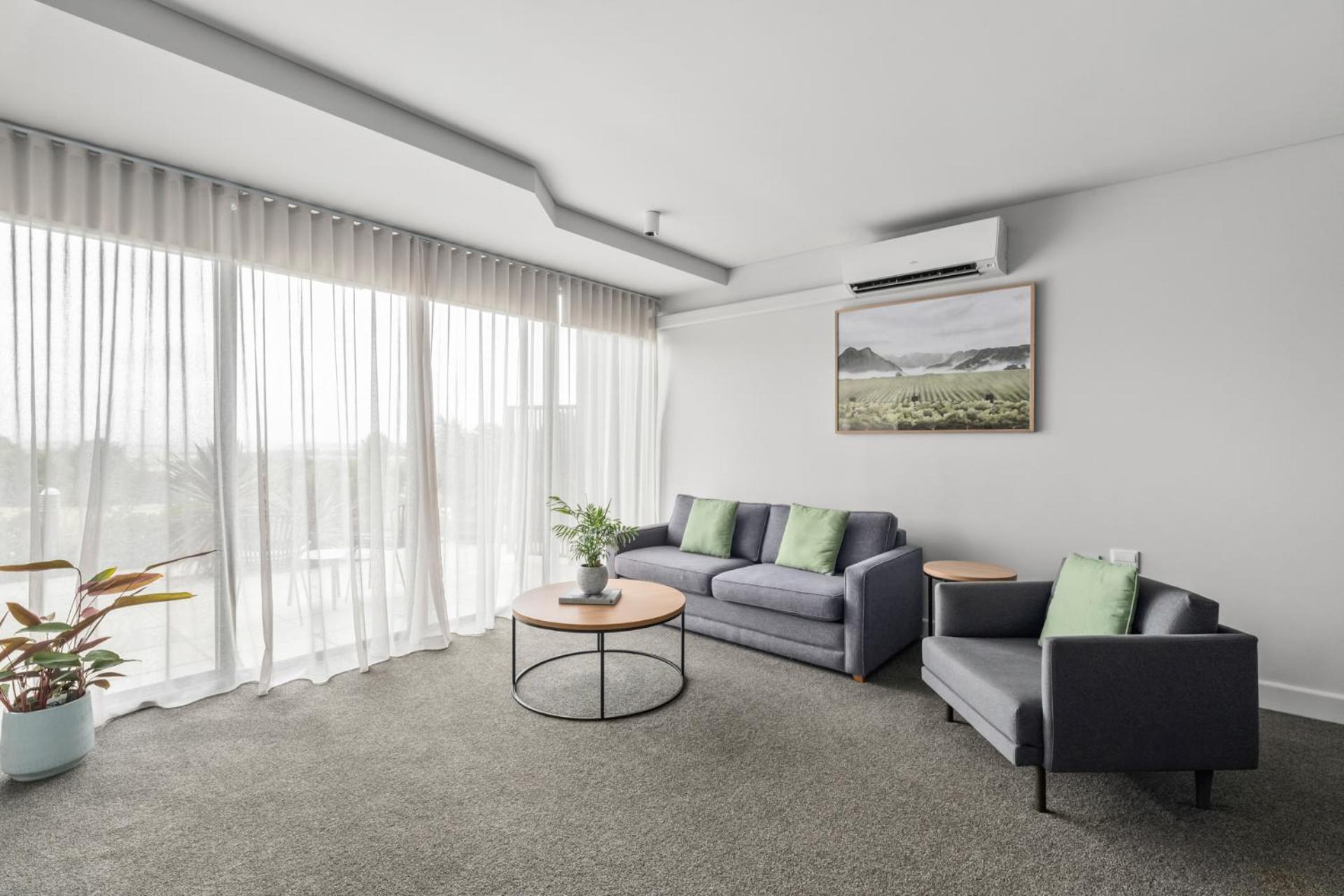 Balgownie Estate Yarra Valley Ярра-Ґлен Екстер'єр фото A living room with a split-type air conditioner